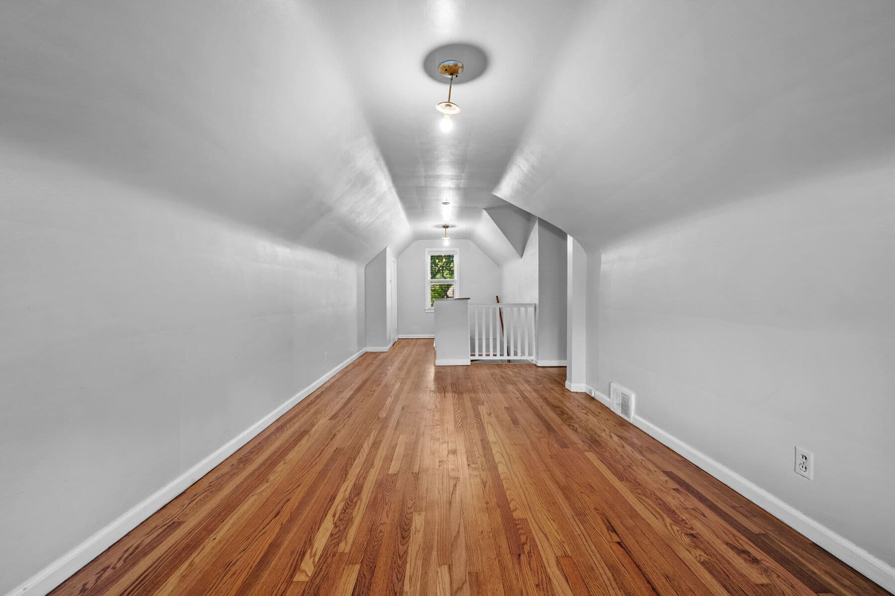Open lounge area in the second-floor primary suite at 3963 Yorkshire
