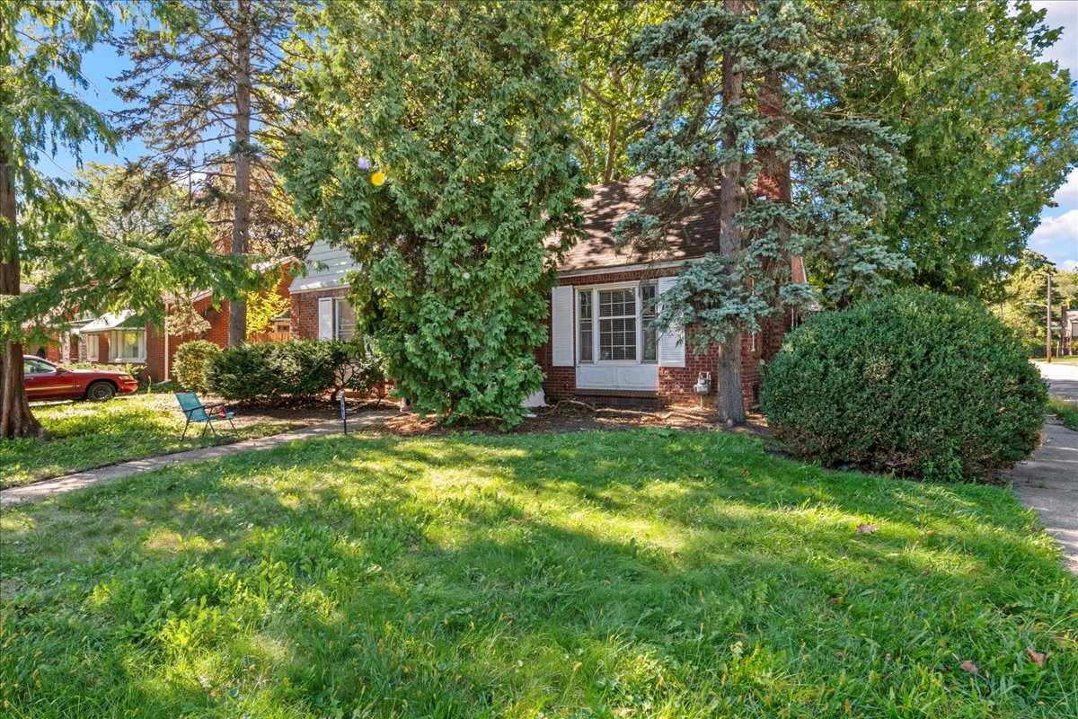 Brick bungalow at 3963 Yorkshire on a tree-lined corner lot in East English Village, Detroit